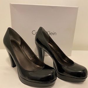 Calvin Klein, black patent leather pumps, size 5
